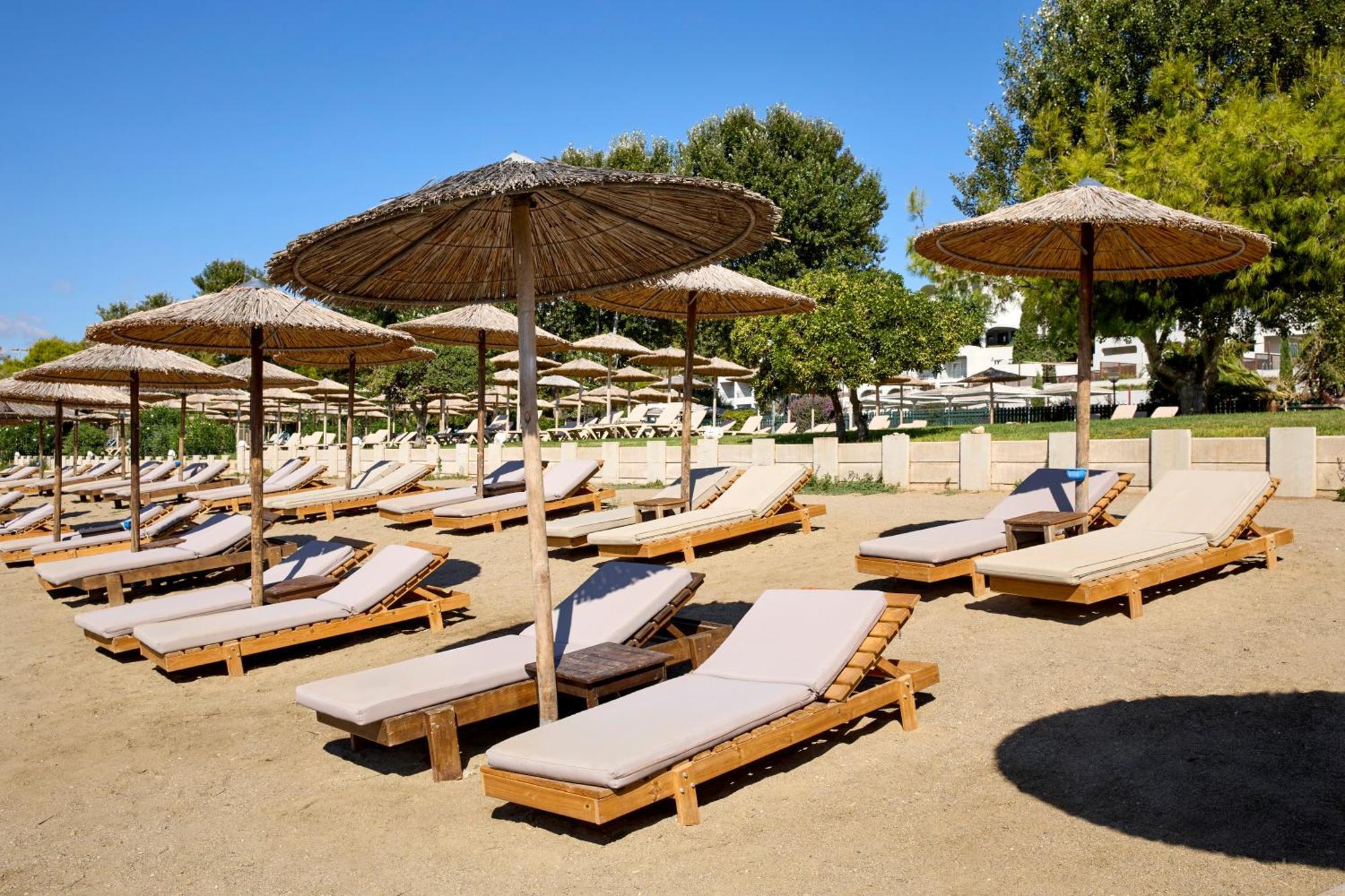 ドルチェ バイ ウインダム アッティカ リビエラ ヴラヴローナ エクステリア 写真 Beach at the Grand Resort